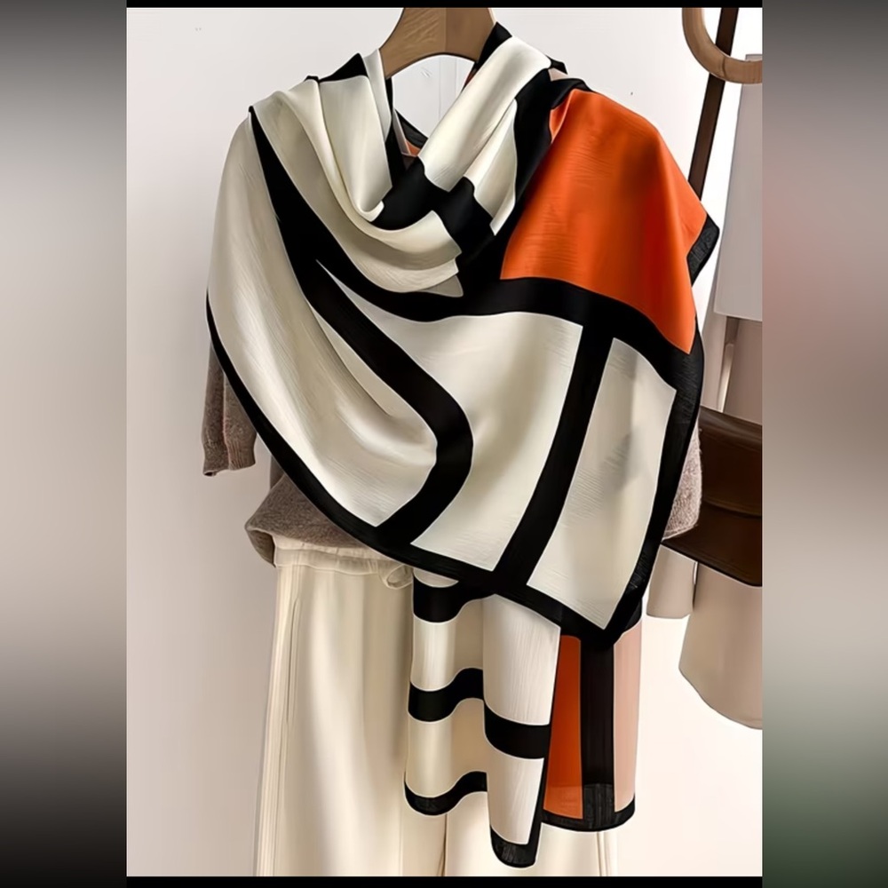 Geometric Black and White Scarf with Orange Accent